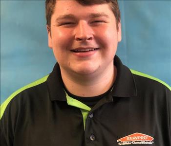 SERVPRO team member blue background