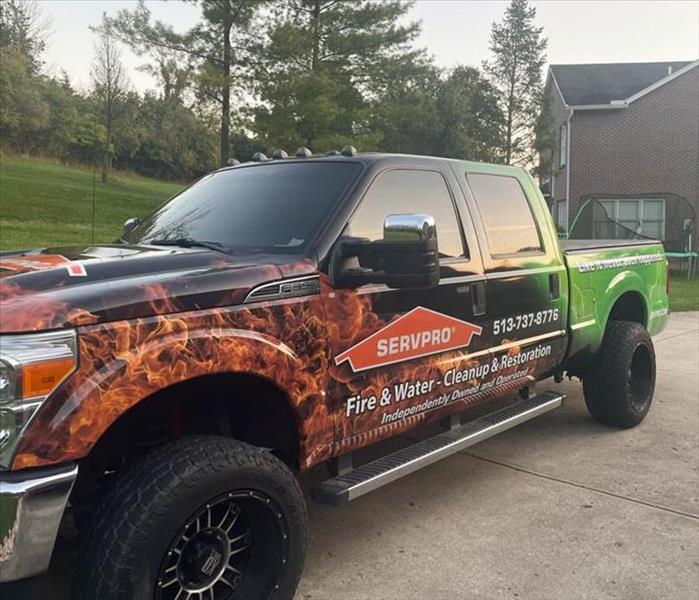 SERVPRO truck in front of a house